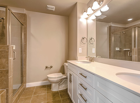 Average master bathroom with white vanity