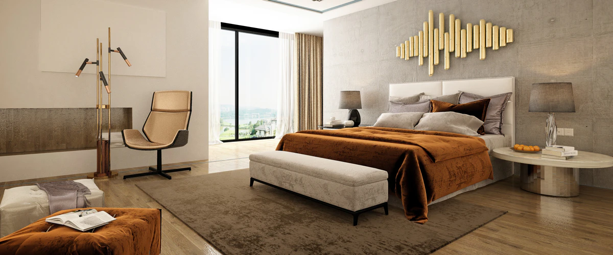 A luxury modern home bedroom with a velvet bedspread, industrial lighting, and a view of the outdoors through floor-to-ceiling windows.